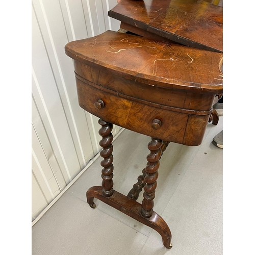 53 - A mahogany ladies writing desk on spiral supports