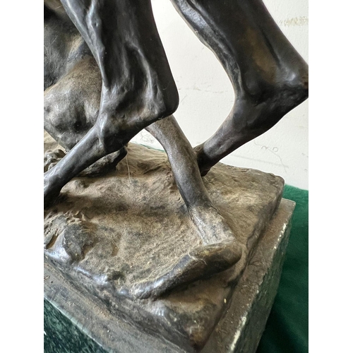 534 - A bronze sculpture of a panther seizing a stag on a marble based, signed (H32cm W30cm)