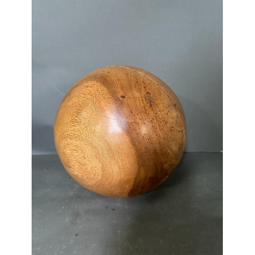 540 - A large contemporary sculptural wooden ball