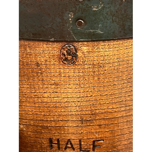 549 - A selection of five various brass, leather and metal bound barrels, buckets etc.(Tallest 30cm)