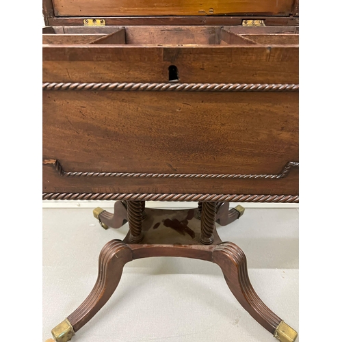 55 - A Regency style Cellarette. The Mahogany caddy opening to compartments and panelled front. Terminati... 