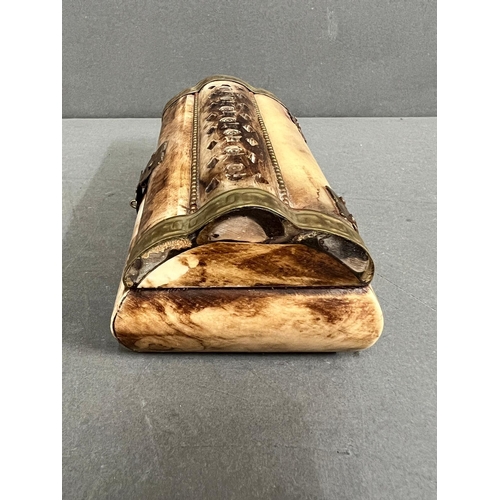 550 - A Bone carved trinket or jewellery box with brass fittings