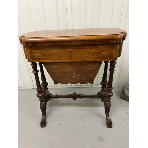 56 - A Victorian Burr Walnut Games Table. The table top opens to reveal Chess, back gammon and cribbage b... 