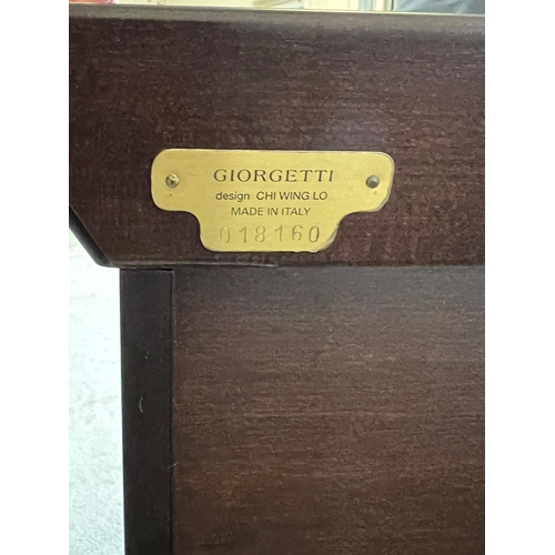 59 - A Giorgetti Chi Wing Lo chest of drawers, ten drawers opening on a spiral system. Serial number 0181... 