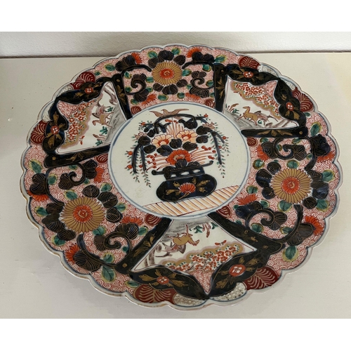 603 - An Imari charger, 19th Century with scalloped 38cm Diameter.