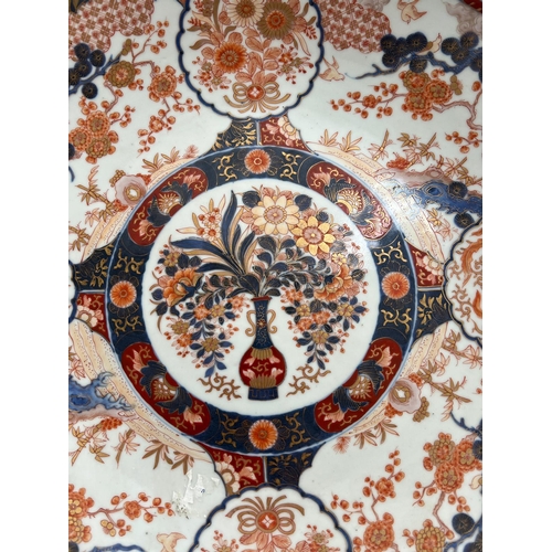 604 - A substantial Imari charger with marks to base 43cm Diameter