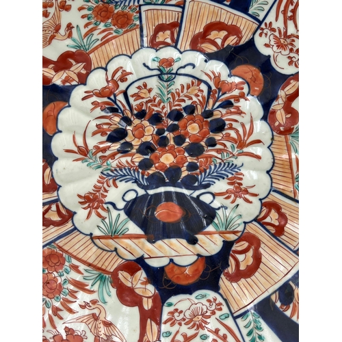 605 - 19th Century Imari charger with scalloped edge