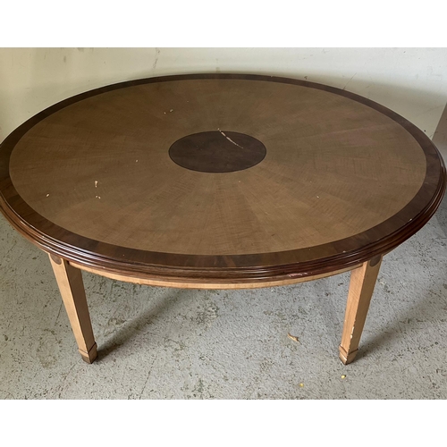 61 - An oval side table with inlaid top on tapering legs by Brights of Nettle bed