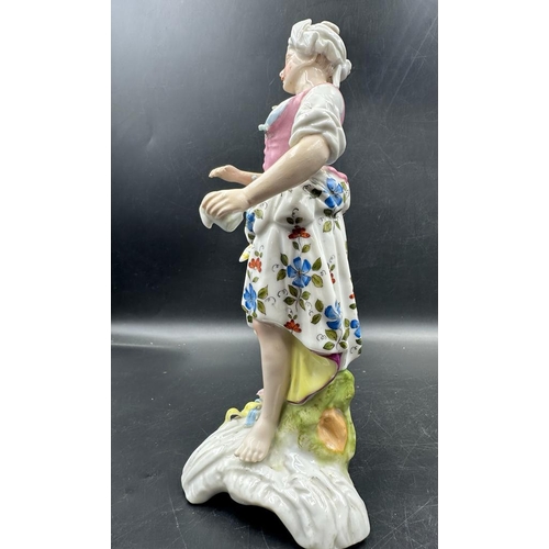 615 - Two hand painted figurines in the manner of Dresden. A gentleman with a hawk and a lady with a baske... 