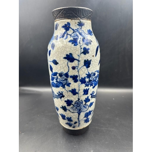 619 - A chinese blue and white crackle glaze dragon vase