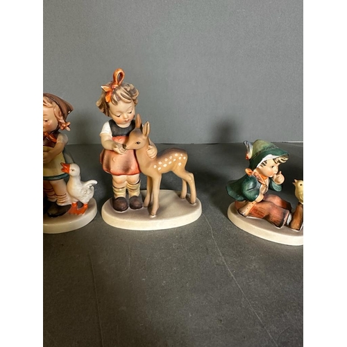 625 - A selection of thirteen Goebel Hummel figurines