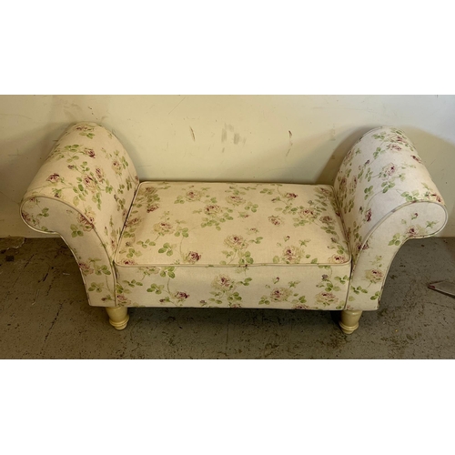 64 - A fabric covered, rose pattern, window seat on turned cream legs (H 66cm x 47cm D 130cm W)