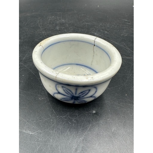 640 - Six Chinese brass egg cups with blue and white ceramic liners AF