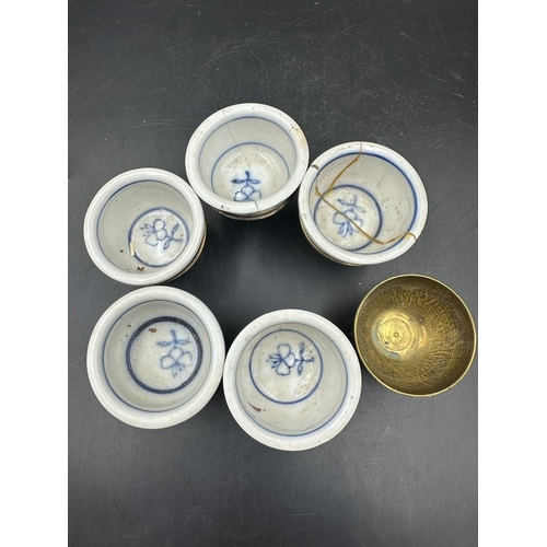 640 - Six Chinese brass egg cups with blue and white ceramic liners AF