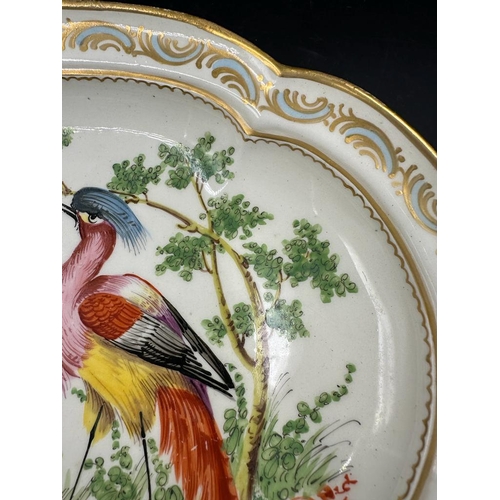 646 - A French hard paste hand painted faux Chelsea dish