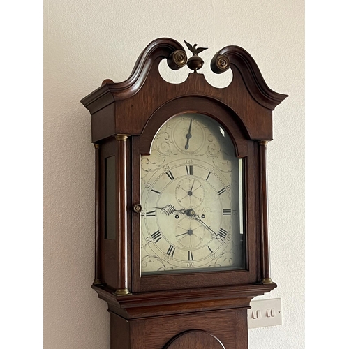 649 - An oak brass dial longcase clock with five pillar movement, seconds and calendar dials also strike/s... 