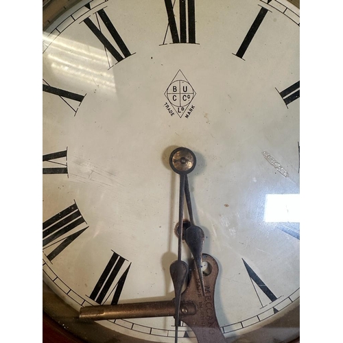 655 - A mahogany cased BUC co station clock