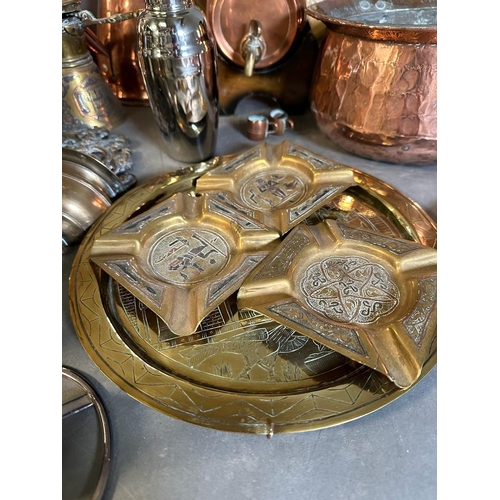 706 - A selection of copper, brass and white metal items to include jugs, trays and a coal scuttle