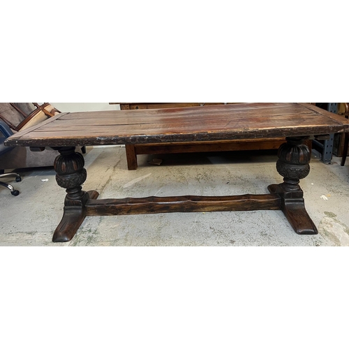 71 - An Elizabethan jointed oak refectory table with three plank top on baluster legs and stretchers (82c... 