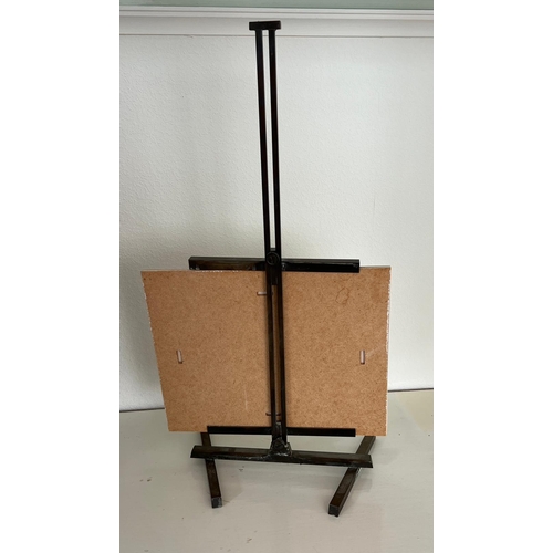 711 - A bronze adjustable easel.