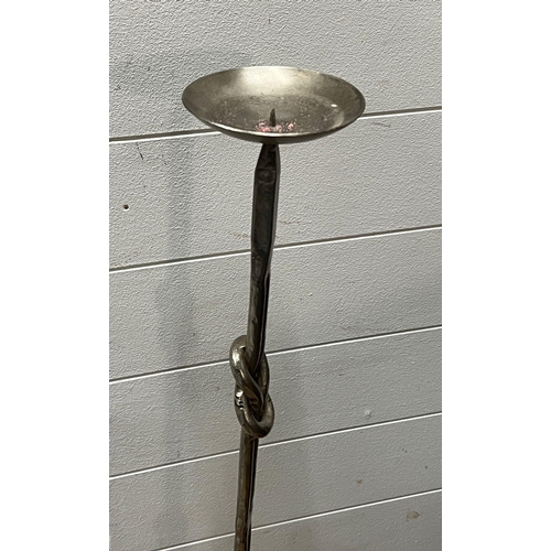 720 - Three metal candle holders (Tallest 107cm)