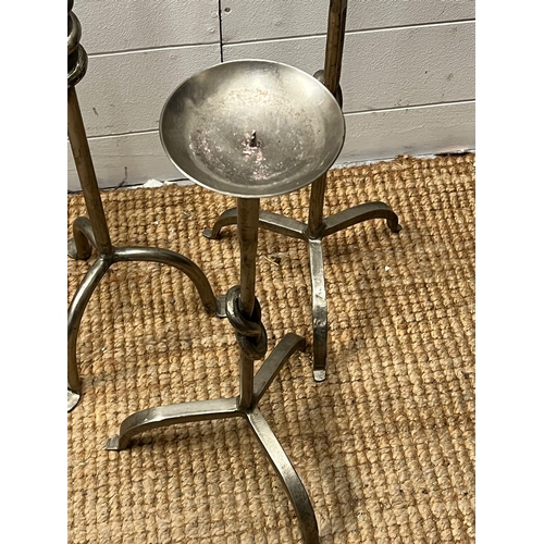 720 - Three metal candle holders (Tallest 107cm)