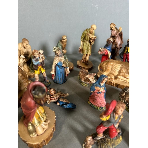 726 - A Nativity set, one set is Italian with additional items from a further set.