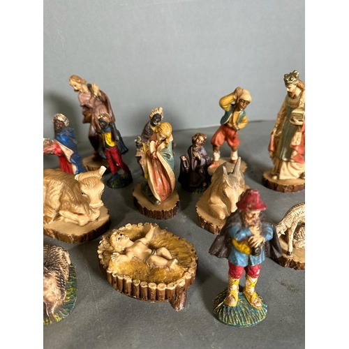 726 - A Nativity set, one set is Italian with additional items from a further set.