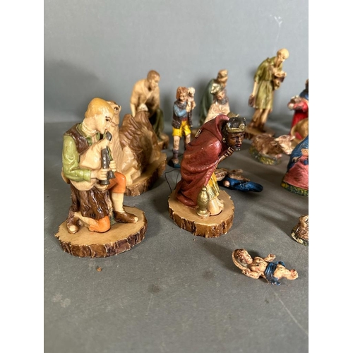 726 - A Nativity set, one set is Italian with additional items from a further set.