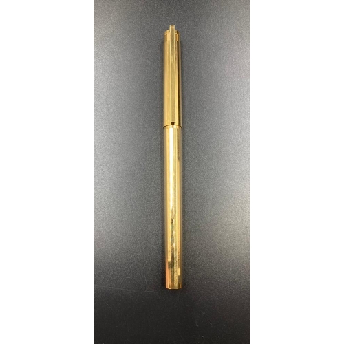 728 - A Dupont pen with 18th gold nib, engraved to lid.