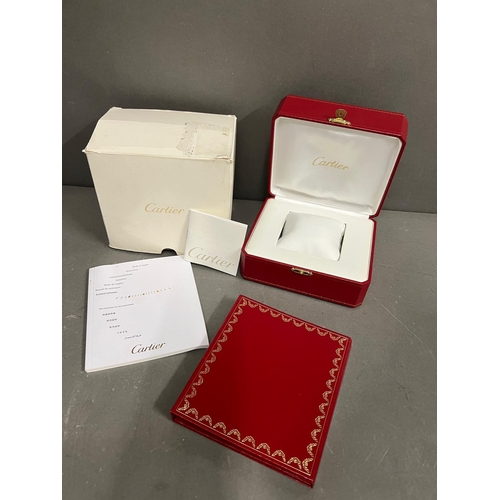 731 - A Cartier watch box with booklet, cd and outer box