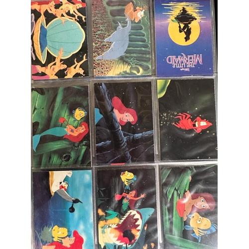 746 - Six Disney trading and collecting card albums to include Beauty and the Beast, The Little Mermaid et... 