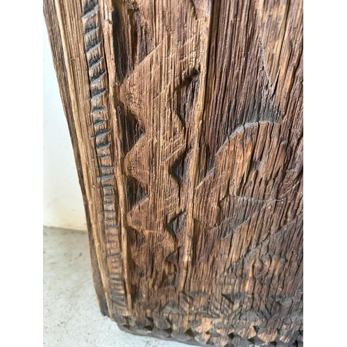 87 - A Burmese hand carved single panel wall hanging (120cm x 42cm)