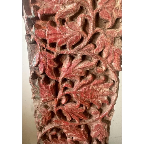 93 - A Burmese hand carved wall hanging oak panel with red painted floral relief 234cm x 18cm