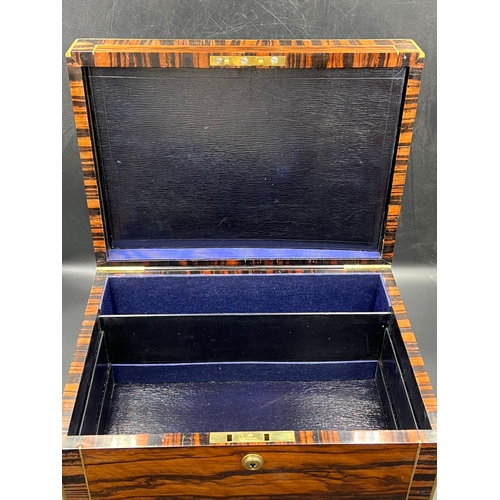 524A - A Victorian coromandel travelling toilet case/box with brass edges and campaign handles with inlaid ... 