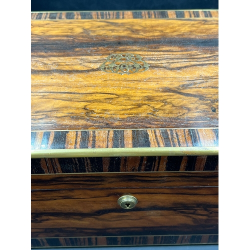 524A - A Victorian coromandel travelling toilet case/box with brass edges and campaign handles with inlaid ... 