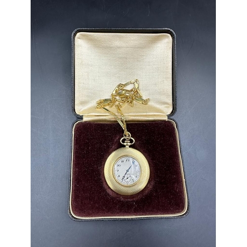 479A - An 18ct gold Longines 16 Jewels pocket watch on an 18ct fancy link chain, marked 750 505mm in length... 