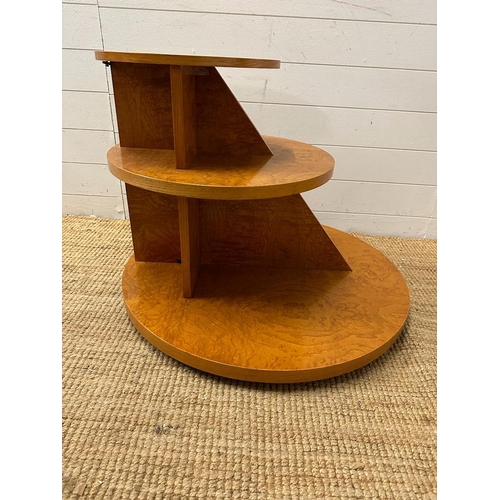 1 - A French Art Deco style bur elm ,three tier table comprising of three graduated disks on flat triang... 