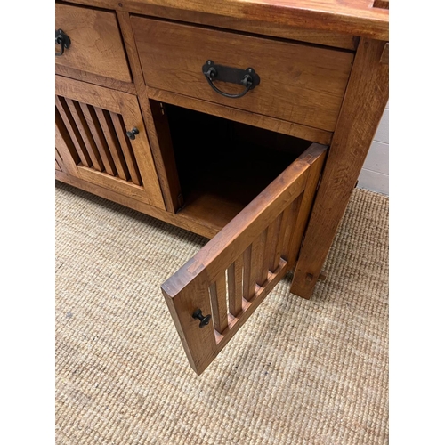 10 - A hardwood sideboard with three drawers and three cupboards under (H80cm W150cm D45cm)