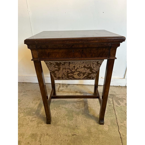 103 - A burr walnut games table with swivel top, green baize and chess board (H77cm W58cm D42cm)