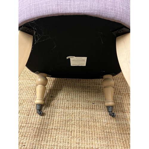 11 - A button back bedroom chair in lilac upholstery