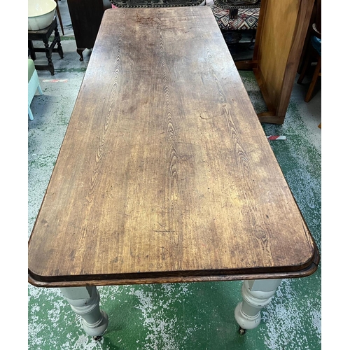 137 - A large farmhouse table (H80cm W244cm D92cm)