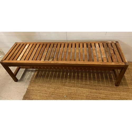 147 - Two teak slatted benches by Habitat (H46cm W146cm D40cm)