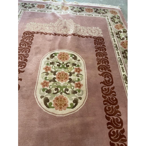 151 - A large rug with geometric pattern 290cm 190cm