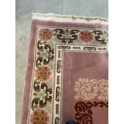 151 - A large rug with geometric pattern 290cm 190cm