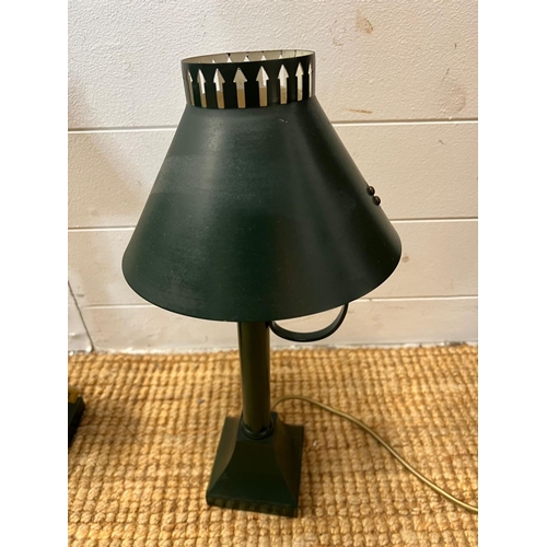 172 - A pair of metal lamp with pieced cut out to rim