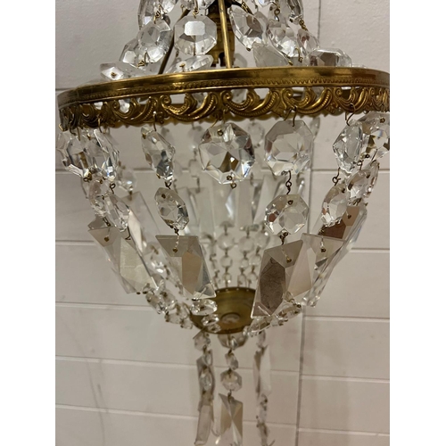 187 - A small chandelier with brass fittings