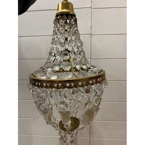 187 - A small chandelier with brass fittings