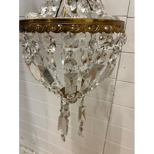 187 - A small chandelier with brass fittings