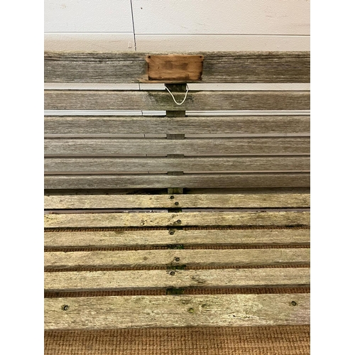 203 - A wooden slatted garden bench